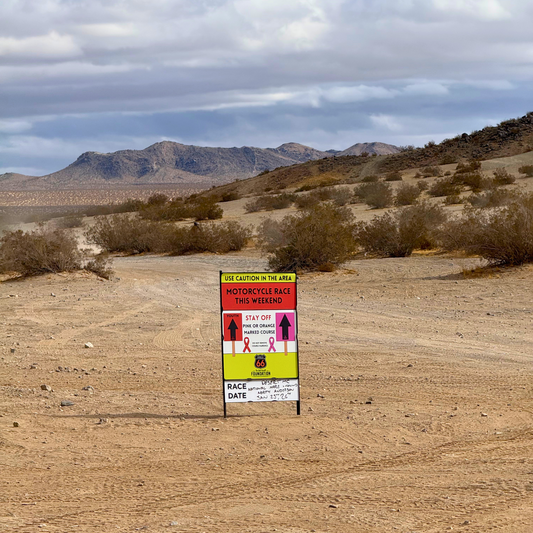 Race In Progress Sign